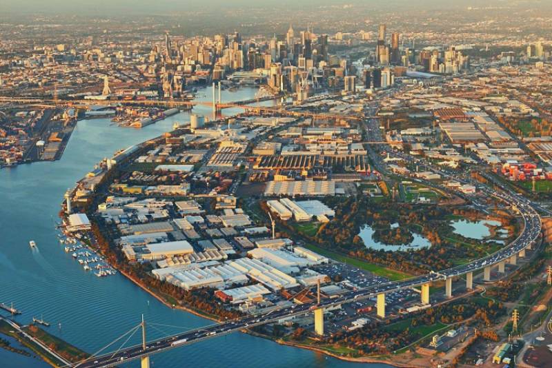 Aerial view of Melbourne Docklands and the CBD skyline at golden hour