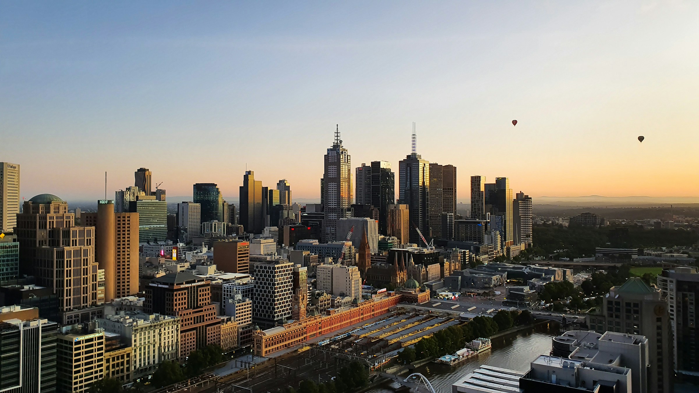 Melbourne CBD skyline and Flinders Street Station at sunrise